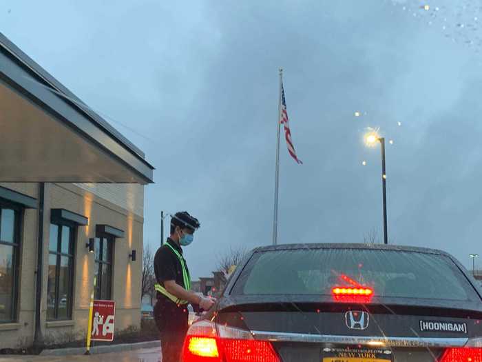 The chain also cuts down on wait times by sending workers out to cars waiting in line to collect payments and deliver food.