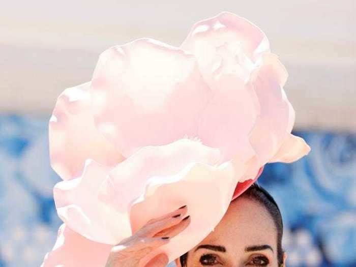 Many matched their headwear, face coverings, and outfits to a tee at Oaks Day.