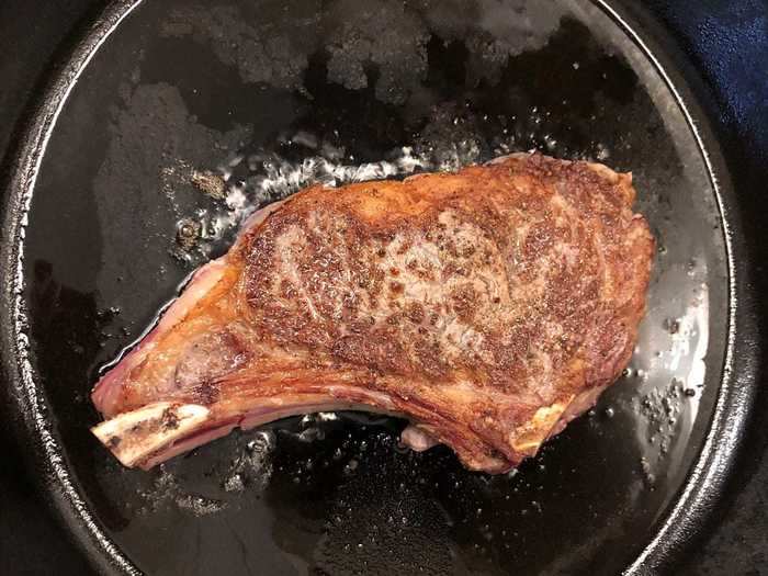 I gave the steak a flip and saw it was browning beautifully.