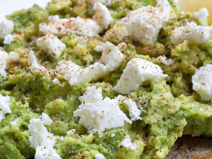 Feta cheese adds a Mediterranean-inspired twist to guacamole.