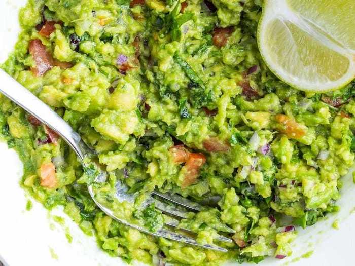 You can add hot sauce and spices to guacamole for an added kick.