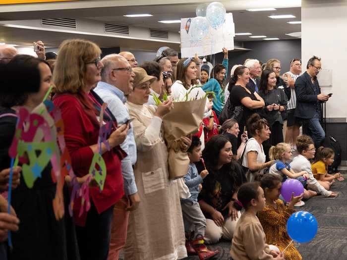 Friends and families in New Zealand eagerly crowded airport arrival terminals to finally be reunited with their loved ones from Australia.