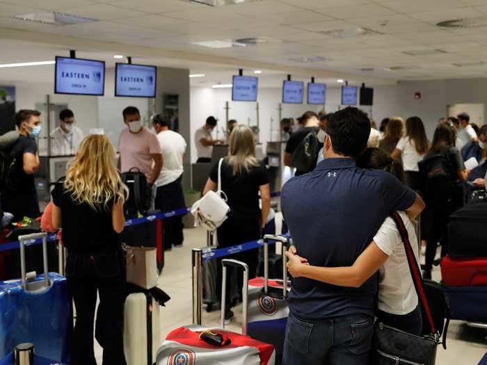 Tourists from the US can travel to other countries like Paraguay as long as they test negative for COVID-19 before flying, according to a United Airlines guide to restrictions by country.