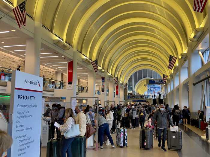 Passengers in US airports have begun crowding check-in sites at airports like LAX.