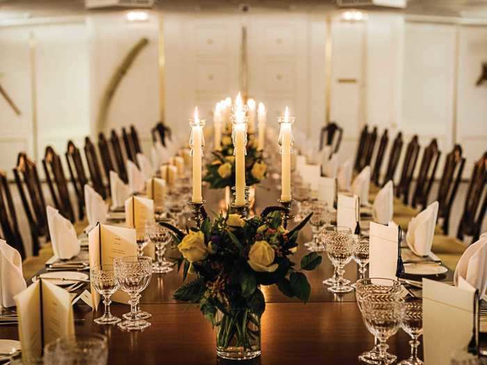 The State Dining Room tables, which could seat 56 people, took three hours to set. The location of each utensil was measured meticulously with a ruler.