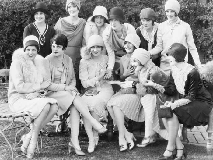 Ladies often gathered for outdoor tea parties, donning hats and breezy dresses.