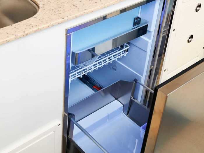 … a refrigerator-freezer, a cooktop, and plenty of counter space.