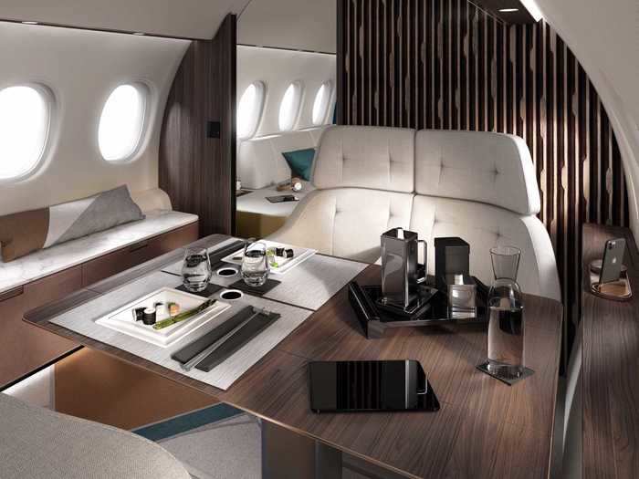 A staple on any wide-cabin private jet, the Falcon 10X also features a dining and conference area that can be used for meals or meetings.