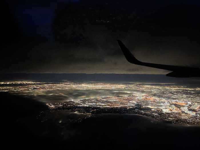 We took off into the Los Angeles night, bound for New York, and flight attendants quickly started the in-flight snack and drink service.