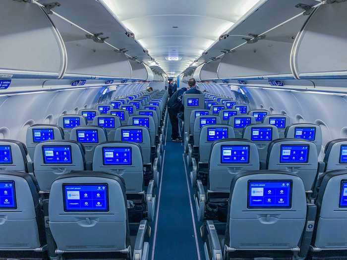 This overnight flight to New York was moderately full but empty enough that most aisles had the middle seat open. JetBlue stopped blocking middle seats in October.