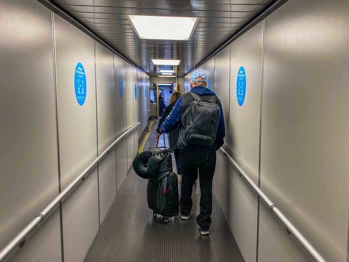 JetBlue had stopped back-to-front boarding earlier in the month, so the normal boarding procedure was followed. The airport had installed social distancing reminders in the jetway, as well.