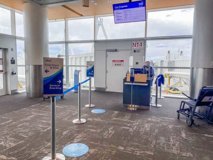 Ticket in hand, I headed to the gate for the quick flight down the coast. The same setup that I had seen at check-in was also at the gate with more floor placards, plexiglass partitions, and hand sanitizer stations.