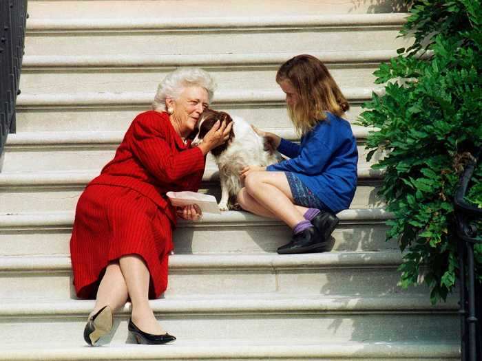 First lady Barbara Bush sat with her granddaughter, also named Barbara, and Millie on the steps of the White House in 1991.