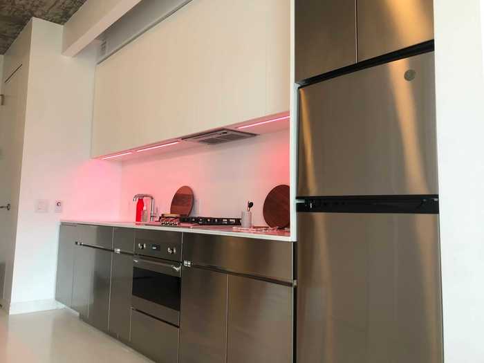 Beyond the Bumblebee technology, the apartment also has a kitchen with stainless-steel appliances.