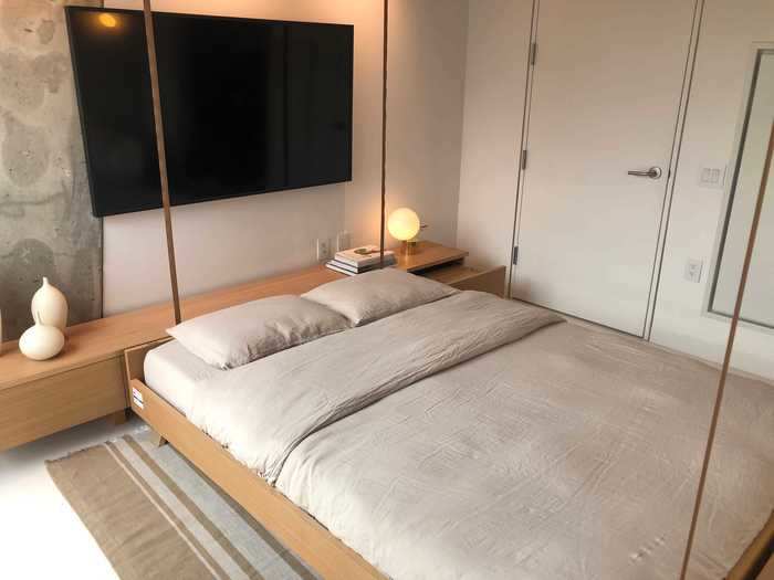 At night, the bed can be fully brought down to create a bedroom.