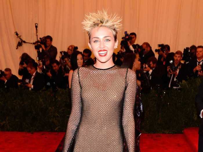 At the 2013 Met Gala, the musician paired an optical-illusion dress with one of her boldest hairstyles to date.