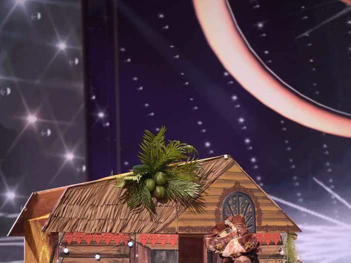 Francisca Luhong James, Miss Malaysia, felt right at home on stage with her costume, which was inspired by the traditional houses found in the country