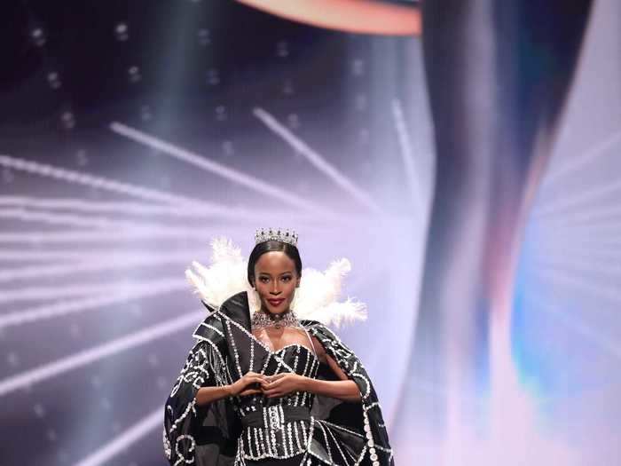 Miss Great Britain, Jeanette Akua, channeled "Bridgerton" with her royal ensemble, complete with a glittering tiara and extravagant cape.