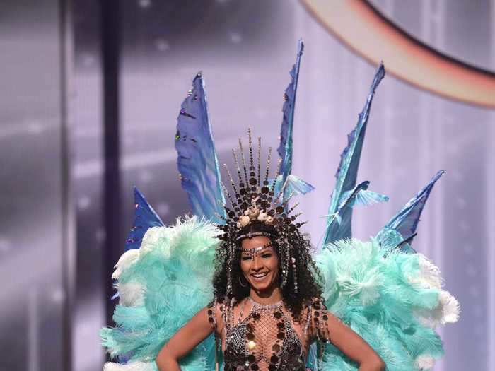 Miss Barbados, Hillary-Ann Williams, wore a mesh, sequined bodice and headpiece with a feathered cape.