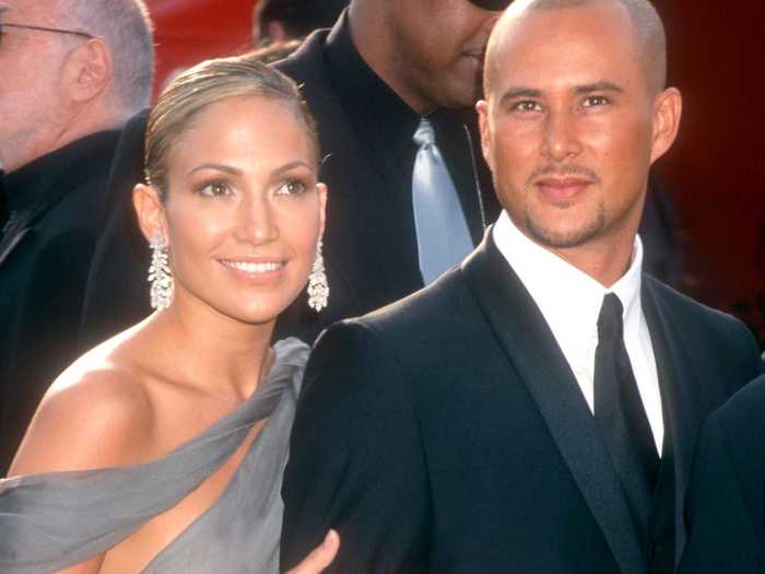 July 2002: Lopez filed for divorce from Judd, a month after breakup reports spread. She and Affleck went public with their relationship that summer.