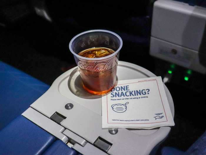 I also tried one of the pre-mixed cocktails that come in cans. Flight attendants poured out the Old Fashioned into a cup with ice, and it was surprisingly good.