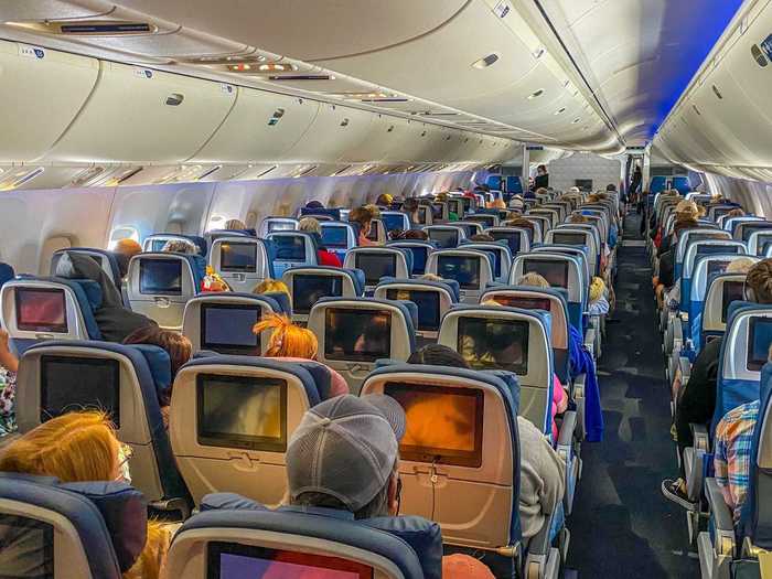 Delta held out the longest of any US airline but ultimately had to start filling planes. Most were wearing masks but I did walk by just after snacks and drinks were handed out so some had taken off their covering to eat or drink.