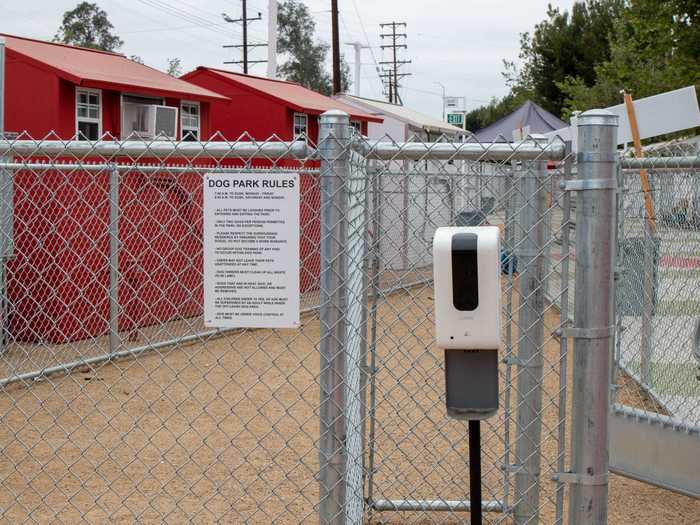 The outdoor communal tables are located right next to these facilities and in front of the small dog park, which sits at the center of the village.