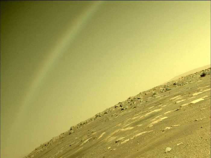 This shot, which appeared to show a rainbow, is actually a lens flare across the dusty Martian sky, agency officials said.