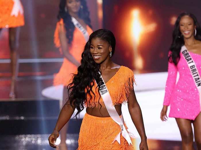 Miss Ghana wore orange eye shadow that matched her fringe crop top and miniskirt.