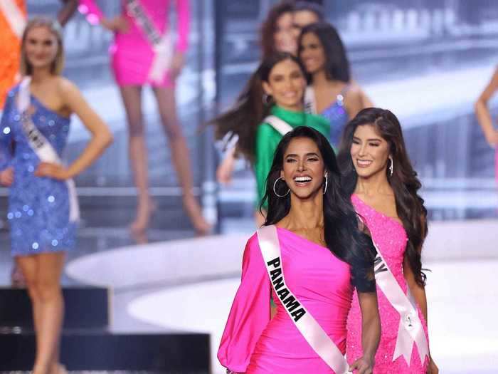 Miss Panama looked radiant in an asymmetrical neon-pink minidress with a single balloon sleeve.