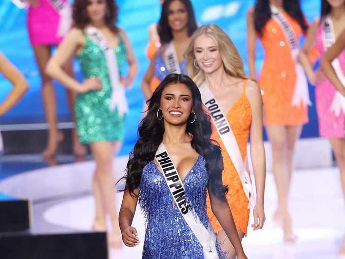 Miss Philippines rocked a sleeveless blue dress with a plunging neckline and sparkling fringe.