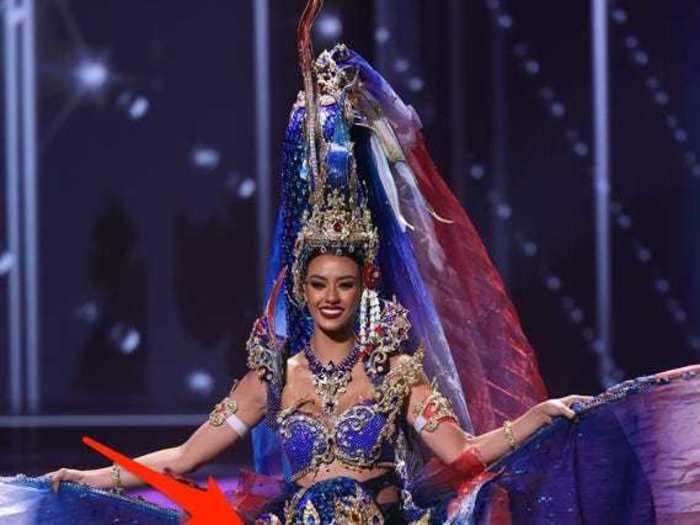 Miss Thailand Amanda Obdam paid homage to her country by revealing a hidden fish in her gown.