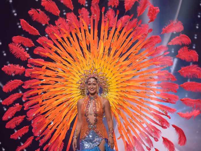 Miss Cayman Islands 2020, Mariah Tibbett, wore a circular ombré headpiece that looked like a sunset.