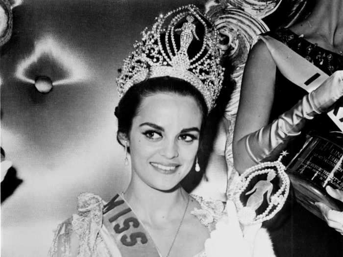 After her 1964 win, Kiriaki "Corinna" Tsopei of Greece held court in a stunning satin gown.