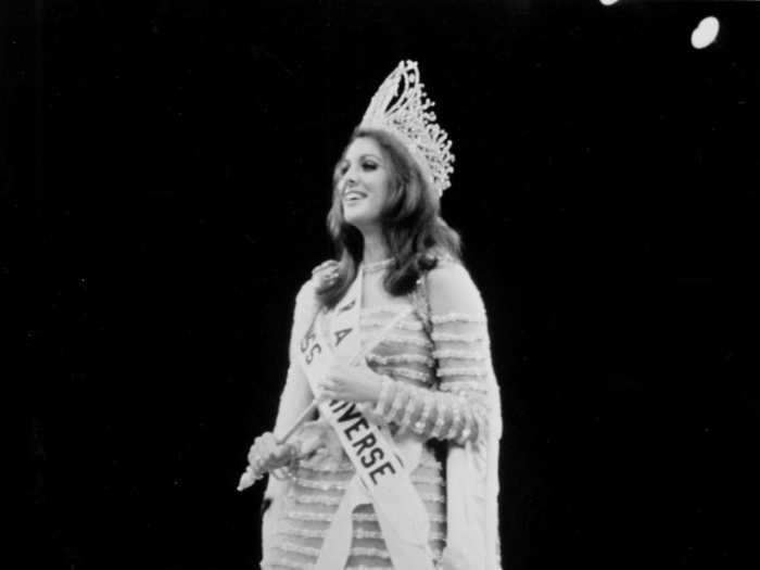 Martha Vasconcellos of Brazil stunned in a beaded gown after winning the 1968 crown.