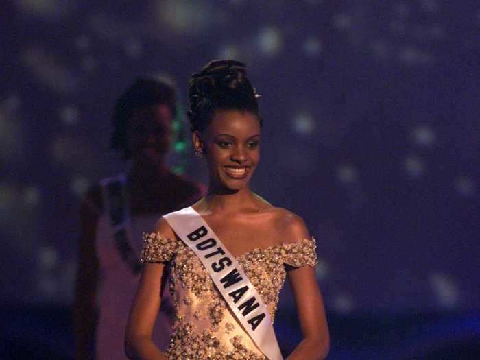 Mpule Kwelagobe competed in an elegant, off-the-shoulder gown in 1999.