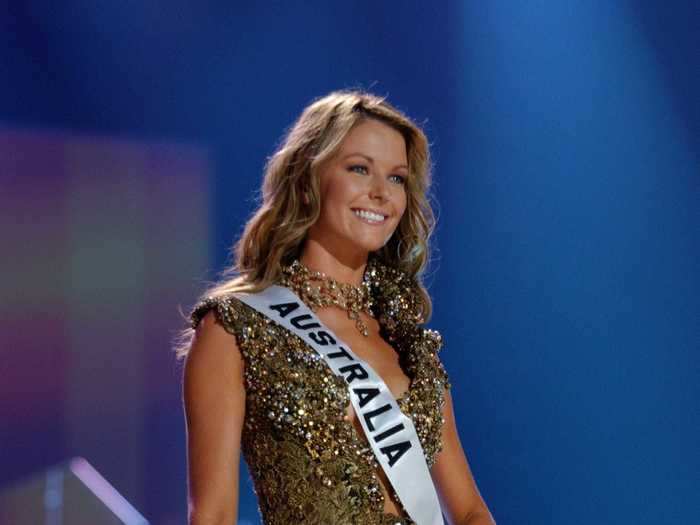 Jennifer Hawkins of Australia was crowned in 2004 while wearing a detailed gold gown.