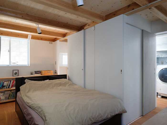 The bedroom resembles a studio apartment but can be divided into two rooms.