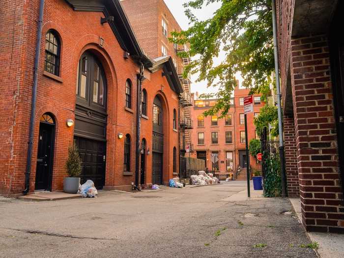 This stunning red-brick carriage house at the beginning of the block is 4 Hunts Lane. It