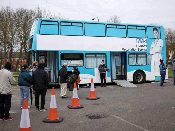 In typical London fashion, health officials have converted double-decker buses into mobile vaccination sites.