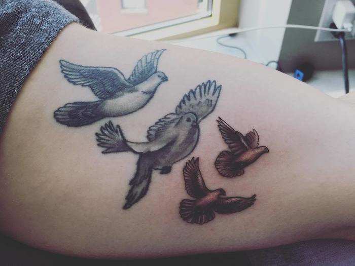 Kevin got four doves on his left bicep in honor of his family in 2016.