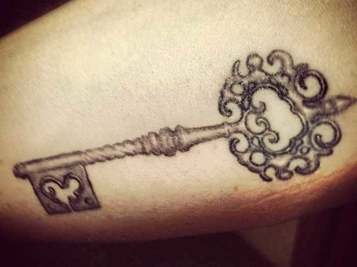 Kevin showed off his "key to heaven" ink in February 2013.