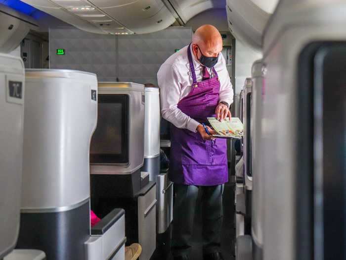 Flight attendants went from seat to seat taking individual orders, just like in pre-pandemic times.