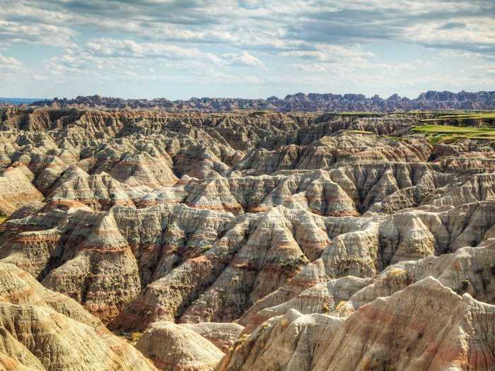 Badlands National Park in South Dakota boasts 244,000 acres of rugged and beautiful landscape.