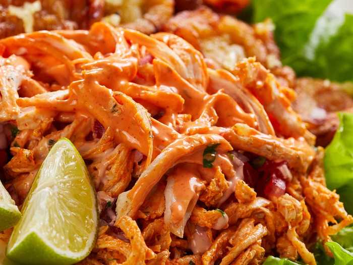 Shredded Buffalo chicken goes great on top of salads.