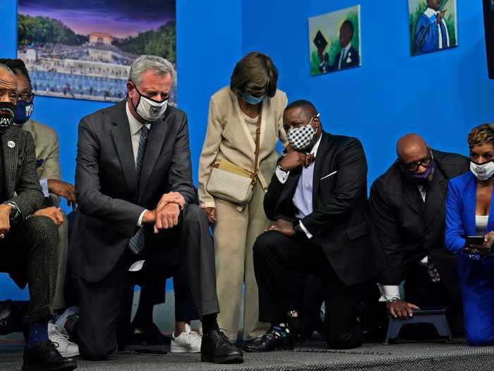 In New York, local leaders took a knee for more than nine minutes to signify how long Chauvin knelt on Floyd