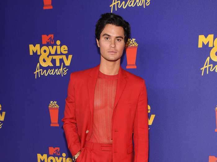 Chase Stokes tried his hand at the monochromatic trend with this red suit and see-through shirt at the MTV Movie and TV Awards.