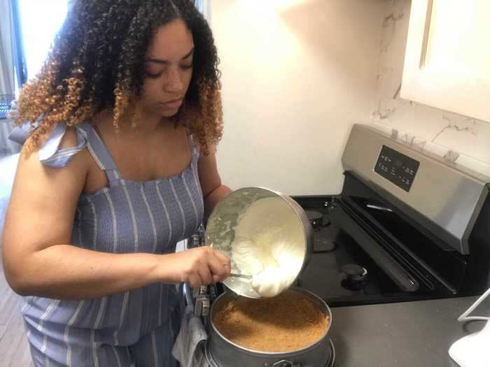 The cheesecake was placed in the fridge to set the filling and crust.