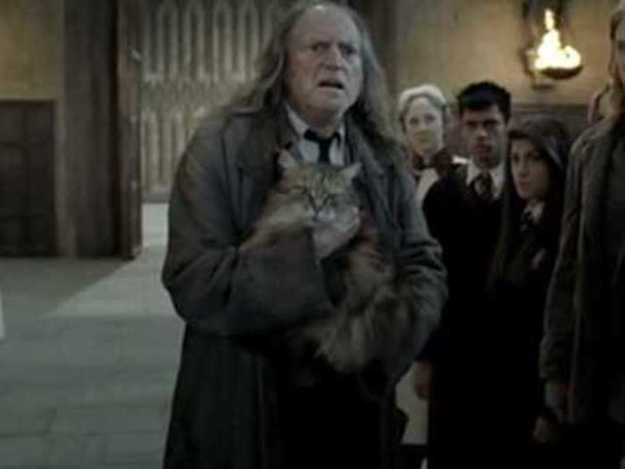 Filch wears another layered, professional-looking outfit for his last scene.