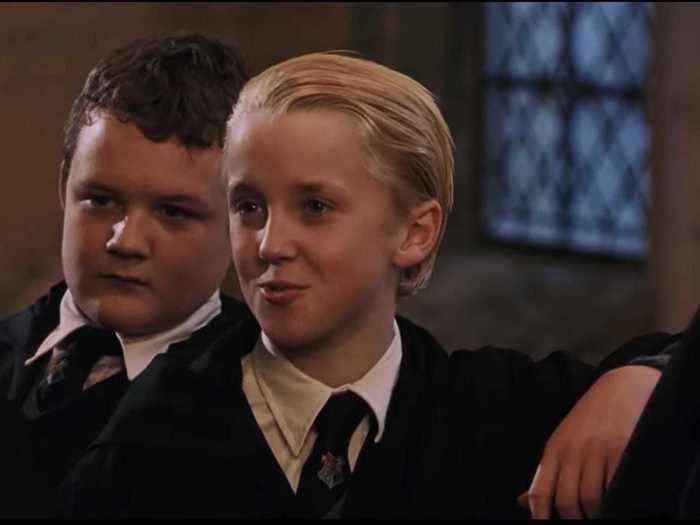 Draco Malfoy wears a Hogwarts uniform without the Slytherin tie for his first scene.